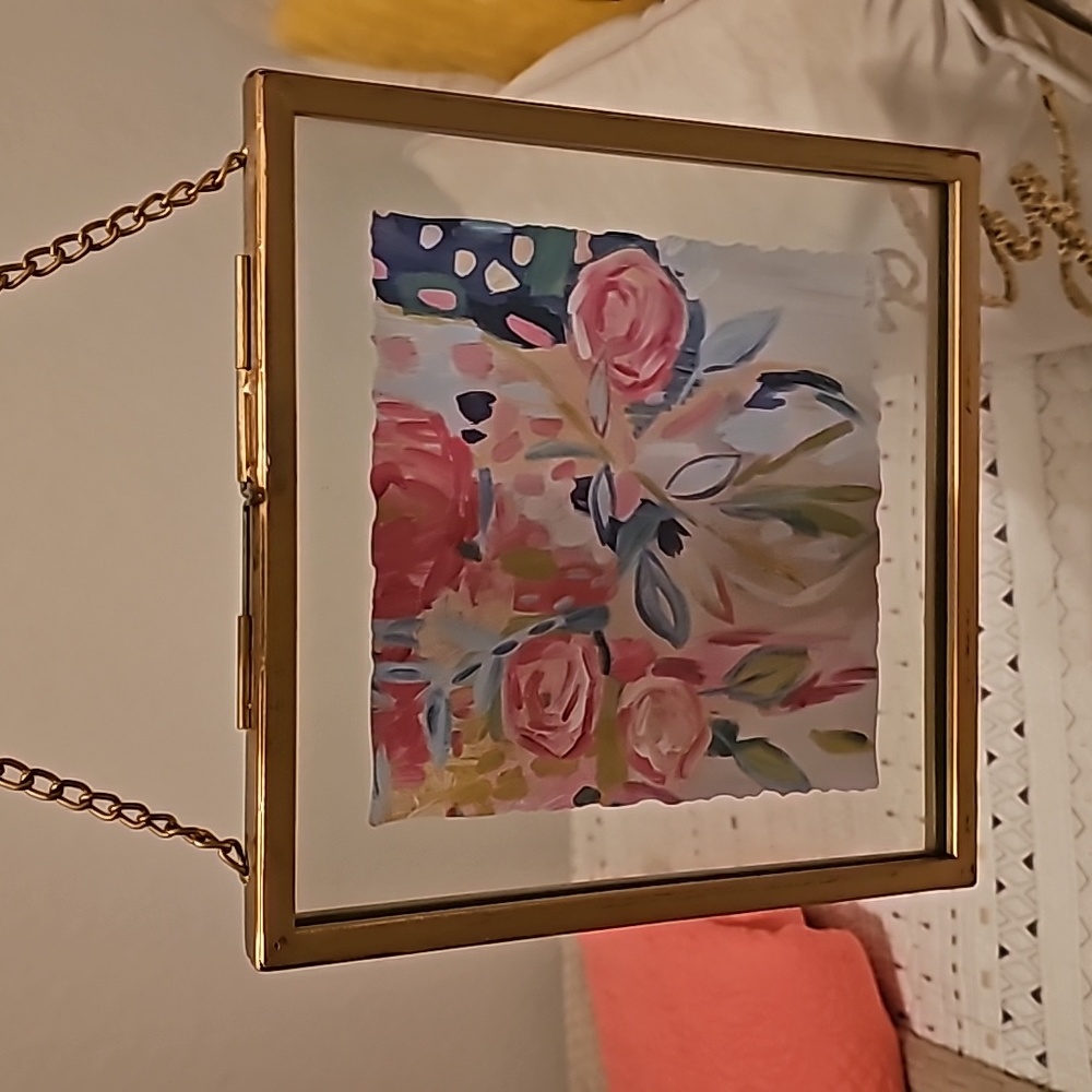 Gold metal frame and chain w double sided glass floral print